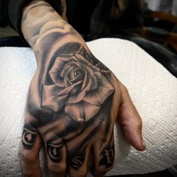 Civilized Tattoo Shop - Hand jammer on Jason by Damon Blitz