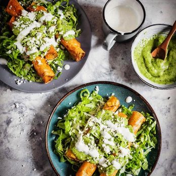 Los Cantaritos - Crispy flautas filled with savory shredded chicken or beef, served with fresh guacamole, sour cream, and salsa. - Mexican Near Me - Toronto, Ontario Los Cantaritos - Crispy flautas filled with savory shredded chicken or beef, served with fresh guacamole, sour cream, and salsa. - Mexican Near Me - Toronto, Ontario