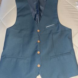 Brown buttons on vest Brown buttons on vest
