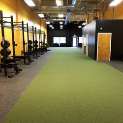 Thrive Performance and Fitness Center - View from the back. Turf and weights