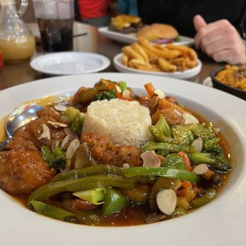 Powder House Restaurant - Zesty Orange Chicken Bowl - Steakhouses Near Me - Keystone, South Dakota Powder House Restaurant - Zesty Orange Chicken Bowl - Steakhouses Near Me - Keystone, South Dakota