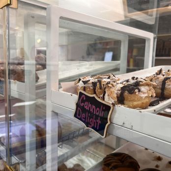 Donut Kingdom - a display of donuts in a glass case - Donuts Near Me - Tallahassee, Florida Donut Kingdom - a display of donuts in a glass case - Donuts Near Me - Tallahassee, Florida