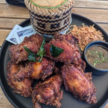 Hanuman Thai Eatery - Fried chicken with rice with crispy onions and a sweet and sour sauce. - Thai Near Me - Costa Mesa, California Hanuman Thai Eatery - Fried chicken with rice with crispy onions and a sweet and sour sauce. - Thai Near Me - Costa Mesa, California