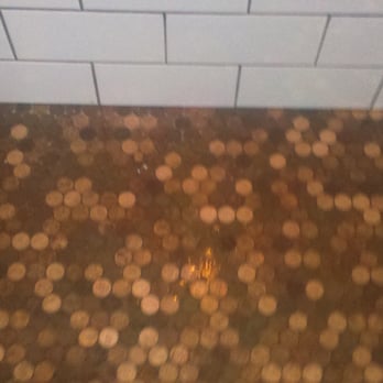 Vinsetta Garage - Pennies in the bathroom floor. - American Near Me - Berkley, Michigan Vinsetta Garage - Pennies in the bathroom floor. - American Near Me - Berkley, Michigan