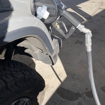 Chevron - a gas pump with a hose attached to it - Convenience Stores Near Me - Flagstaff, Arizona Chevron - a gas pump with a hose attached to it - Convenience Stores Near Me - Flagstaff, Arizona
