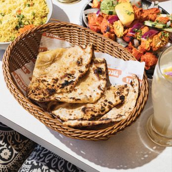 Ticca Tikka Indian Cuisine - Garlic Cheesy Naan - Indian Near Me - Oceanside, California Ticca Tikka Indian Cuisine - Garlic Cheesy Naan - Indian Near Me - Oceanside, California