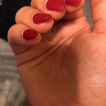 Katella Nails & Spa - Weird shape and color not fully applied by Mary. Tried addressing the problem and she screamed at us and refused to find a common solution - Nail Salons Near Me - Orange, California