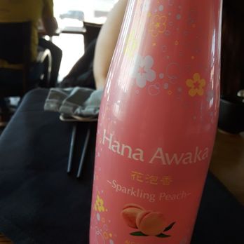 Momo Mee - Peach sparkly sake - Pan Asian Near Me - Milwaukee, Wisconsin Momo Mee - Peach sparkly sake - Pan Asian Near Me - Milwaukee, Wisconsin