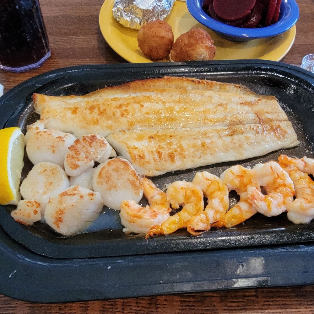 Darrell's Restaurant - Broiled flounder, broiled shrimp, broiled scallops. I ordered a baked potato and pickled Beets for a side. - Seafood Near Me - Manteo, North Carolina Darrell's Restaurant - Broiled flounder, broiled shrimp, broiled scallops. I ordered a baked potato and pickled Beets for a side. - Seafood Near Me - Manteo, North Carolina