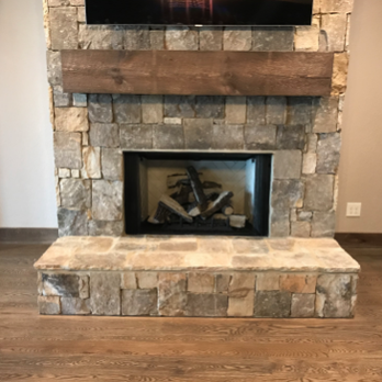Tate Fireplaces - a picture of a fireplace with a tv above it - General Contractors Near Me - Canton, Georgia Tate Fireplaces - a picture of a fireplace with a tv above it - General Contractors Near Me - Canton, Georgia