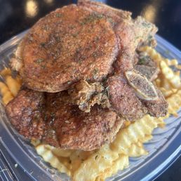 Side of (2) pork chops & large fries. Side of (2) pork chops & large fries.