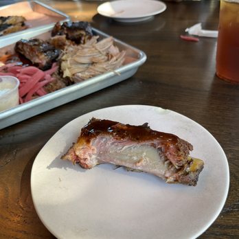 Sophie's BBQ - Bite test on a rib - Barbeque Near Me - Havertown, Pennsylvania Sophie's BBQ - Bite test on a rib - Barbeque Near Me - Havertown, Pennsylvania