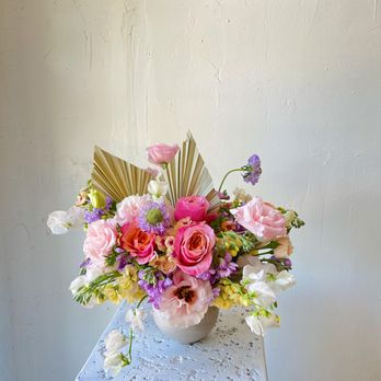 Plum Studios - An artistic pastel flower arrangement featuring dried palm leaves, inspired by boho aesthetics, beautifully blends soft hues, - Florists Near Me - Phoenix, Arizona