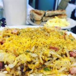 Jennifer's Roundabout Restaurant - Farmers hash (formerly sparks hash), eggs, and rye toast.
