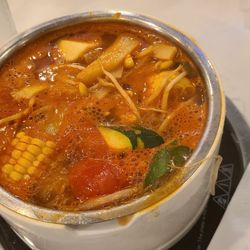 Homey - A large variety of meats and veggies to select from on buffet.