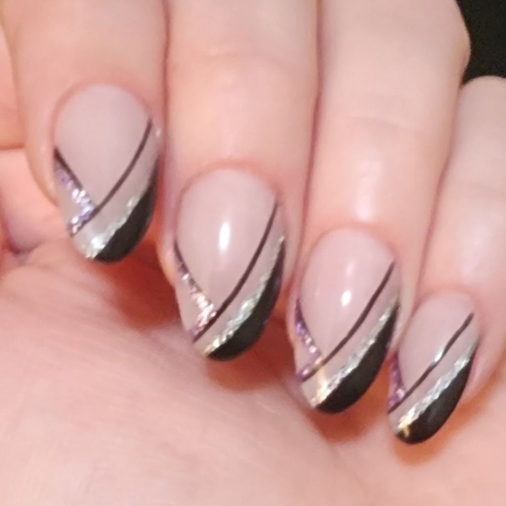 Acrylic fill, with sheer pink nude gel all over, and black variation of French tip design with silver and purple to match the ring.