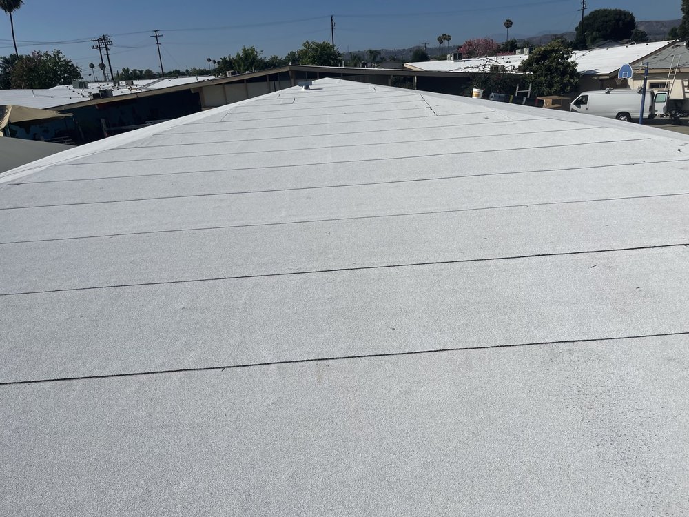 Slide of Pacific Roofing