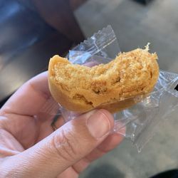 One of the packaged snacks available near the register. Just a hint of sweetness (it's a kind of dry chicken pastry).