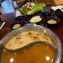 Red Miso Soup and tonkatsu with black garlic oil Red Miso Soup and tonkatsu with black garlic oil