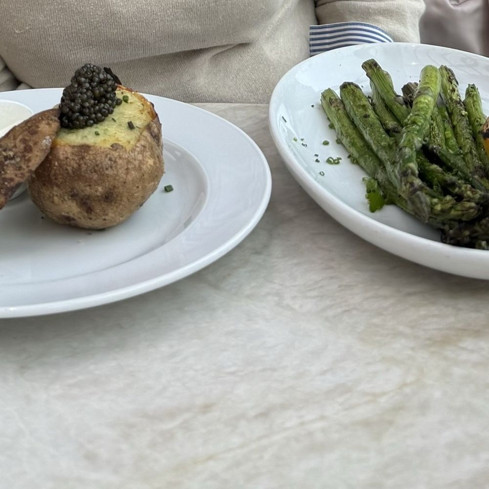 RH Rooftop Restaurant at RH Raleigh - Baked potato with caviar and asparagus. My wife absolutely loved both dishes. 10/10. - Breakfast & Brunch Near Me - Raleigh, North Carolina RH Rooftop Restaurant at RH Raleigh - Baked potato with caviar and asparagus. My wife absolutely loved both dishes. 10/10. - Breakfast & Brunch Near Me - Raleigh, North Carolina