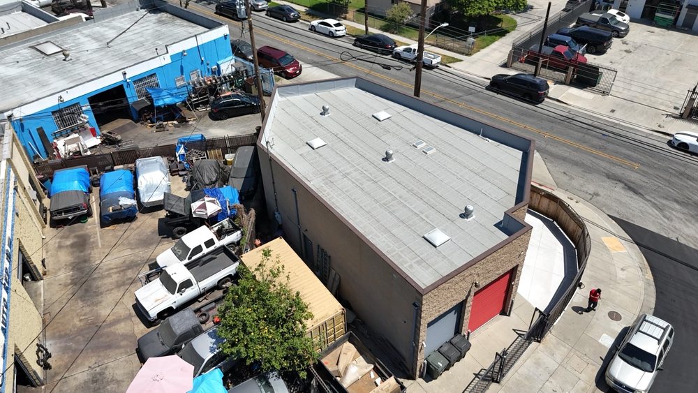 Slide of Meza Roofing Systems