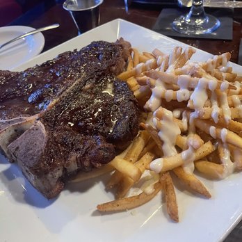 Back Room Steakhouse - 28oz Porterhouse Aioli Fries - Steakhouses Near Me - Apopka, Florida