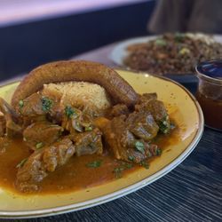Seco de Chivo and chaulafan  Both served with Maduro