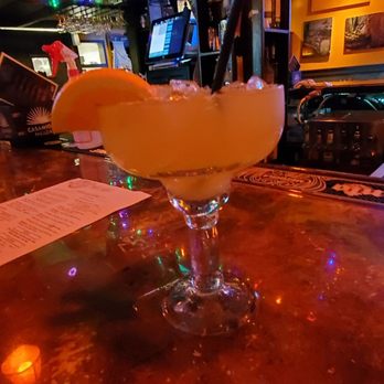 Blue Agave - a glass filled with a drink on a bar - Bars Near Me - Vero Beach, Florida