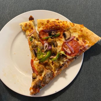 Pizza Hut - a slice of pizza on a plate - Chicken Wings Near Me - Huber Heights, Ohio