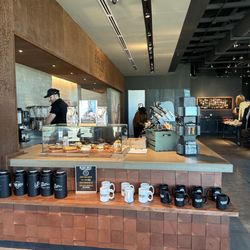 Black Rifle Coffee - Some coffee mugs available to purchase and samples of food.
