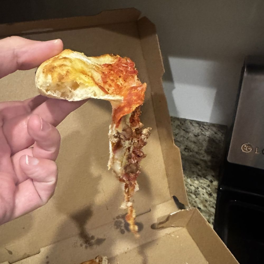 Saddest pizza in the world, what is going on with the crust