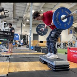 Paradox Fitness - Deficit Barbell Rows. More Range, More gains, Quality technique. Whether in-person or out of town, Paradox Fitness can guide you there.