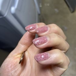 Sassy's Nails & Spa - This is my left hand for comparison with no yellow spots.