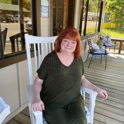 Beach Cutters - Jody taking a little break after her beautiful red hair color on our deck.