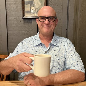 Cracker Barrel Old Country Store - Husband enjoying a cup of Joe - American Near Me - Tucson, Arizona