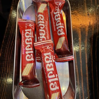 Three Roosters - Cute little wafers with the check - Thai Near Me - New York, New York Three Roosters - Cute little wafers with the check - Thai Near Me - New York, New York