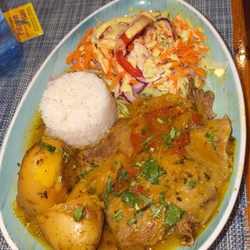 Patacón Pisao - I also enjoyed the sobrebarriga a la plancha, a juicy, flavorful cut of beef served with sauce, rice, potatoes, and a fresh salad.