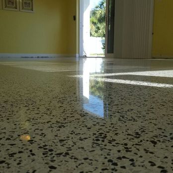 Mr Terrazzo - a room with yellow walls and a ceiling fan - General Contractors Near Me Mr Terrazzo - a room with yellow walls and a ceiling fan - General Contractors Near Me