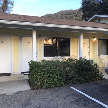 Lazy J Ranch Motel - The front of our room area. Has 2 chairs and small coffee table outside. Relaxing - Hotels Near Me - Three Rivers, California Lazy J Ranch Motel - The front of our room area. Has 2 chairs and small coffee table outside. Relaxing - Hotels Near Me - Three Rivers, California