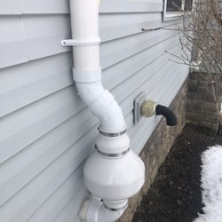 Radon Survey Systems - External radon fan unit with appropriate brackets for a secure instal.