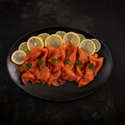 Belhaven Smokehouse - Our classic smoked salmon is slowly dry cured and traditionally smoked to create a oaky flavour with a firm texture.