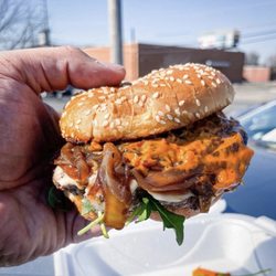 Fork & Spoon - 8oz. Short rib angus smash burger, with melted Vermont white cheddar, onion jam, arugula, spicy chipotle Mayo, toasted brioche
