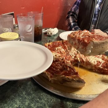 Mugsy's Hideout - Chicago supreme cheesy slice - Pizza Near Me - Murray, Kentucky