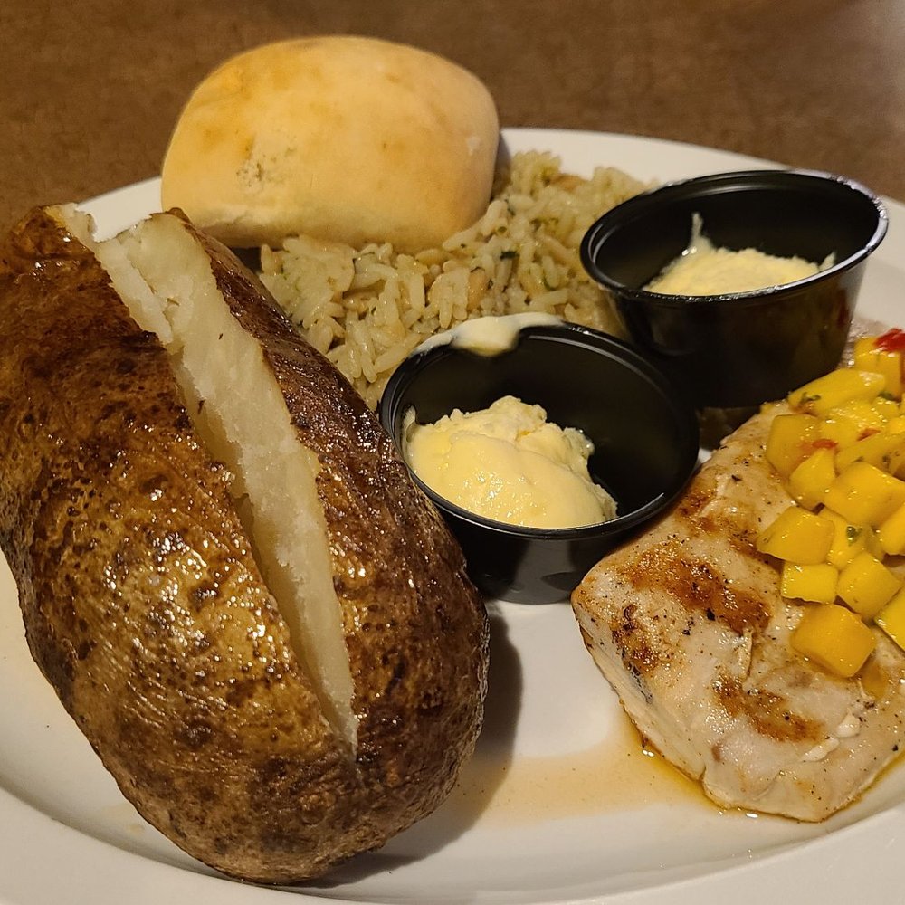 Dawsons On Main - Flavorful Grilled Mahi-Mahi topped w/ Mango Salsa, Cilantro Rice & perfectly Baked Potato. Husband was extremely happy with selection. - American Near Me - Indianapolis, Indiana