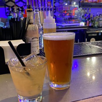 Lucille - two glasses of beer on a bar - Bars Near Me - Austin, Texas