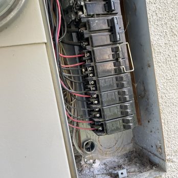 EV Pros - Close up of panel penetration directly to the wall connector. - EV Charging Stations Near Me - Santa Ana, California EV Pros - Close up of panel penetration directly to the wall connector. - EV Charging Stations Near Me - Santa Ana, California