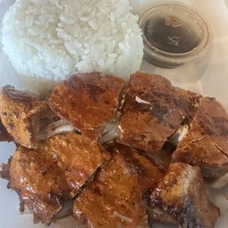 About 1/2 kb of lechon chopped up. It's served with rice and soy based sauce.