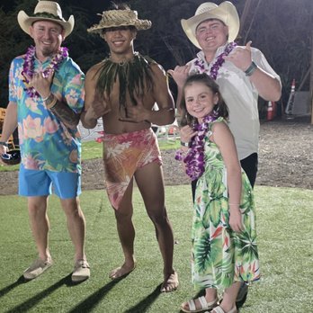 Mauka Warriors Luau - Family pictures with dancer - Cultural Center Near Me - Kapolei, Hawaii Mauka Warriors Luau - Family pictures with dancer - Cultural Center Near Me - Kapolei, Hawaii
