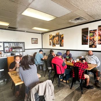 Thai Noodle King - a group of people sitting at tables in a restaurant - Thai Near Me - Bellflower, California Thai Noodle King - a group of people sitting at tables in a restaurant - Thai Near Me - Bellflower, California