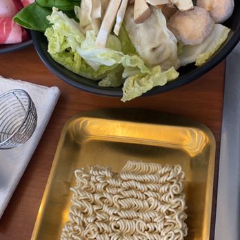 Shabu Day - Close up of the veggies! 2 different kinds of mushrooms, Fish Balls, Dumplings, Bok Choy, and Napa Cabbage! - Korean Near Me - St. Louis, Missouri Shabu Day - Close up of the veggies! 2 different kinds of mushrooms, Fish Balls, Dumplings, Bok Choy, and Napa Cabbage! - Korean Near Me - St. Louis, Missouri